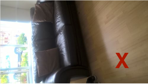 Example of a bad photograph placed on eBay, depicting a sofa for sale